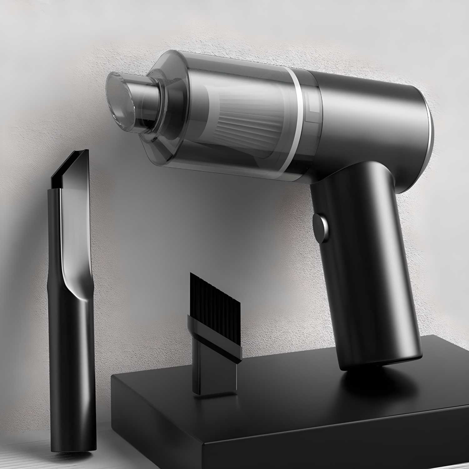 Black and silver handheld vacuum cleaner with attachments on a light gray background